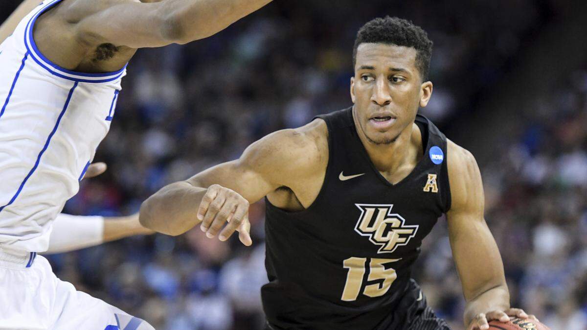 Central Florida guard Aubrey Dawkins (15) dribbles the ball against Duke forward Cam Reddish (2) during the second half of a second-round game in the NCAA men’s college basketball tournament Sunday, March 24, 2019, in Columbia, S.C. Duke defeated Central Florida 77-76.