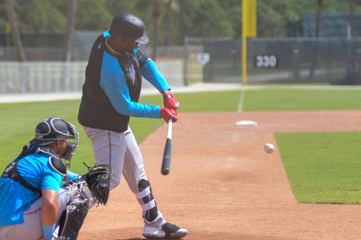 Miami Marlins outfielder/designated hitter Jorge Soler swings during a live batting practice session against Edward Cabrera (not pictured) on Tuesday, March 22, 2022, on a back field at the Roger Dean Chevrolet Stadium complex in Jupiter, Florida.