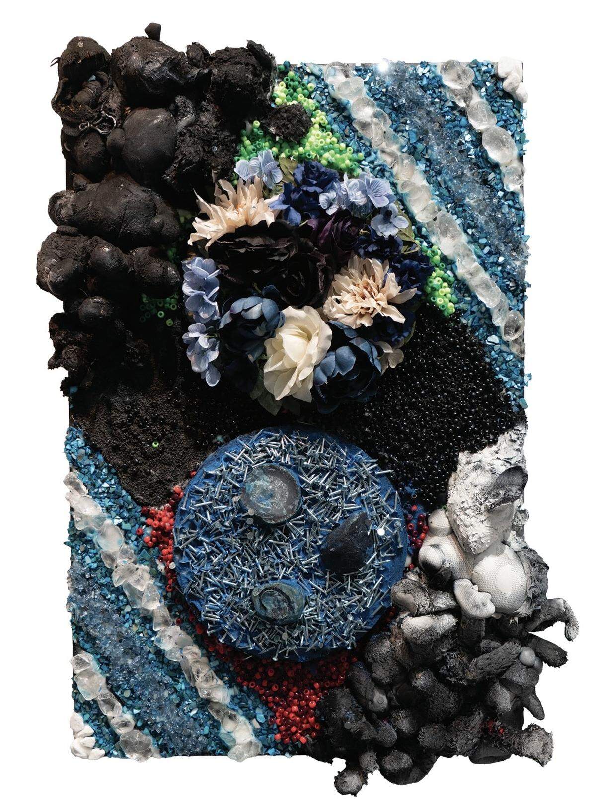 T. Eliott Mansa’s ‘Ubuntu (for Marcus)’ is on view at S’uns & Shadows,’ an exhibition at the Marshall L. Davis Sr. African Heritage Cultural Arts Center.