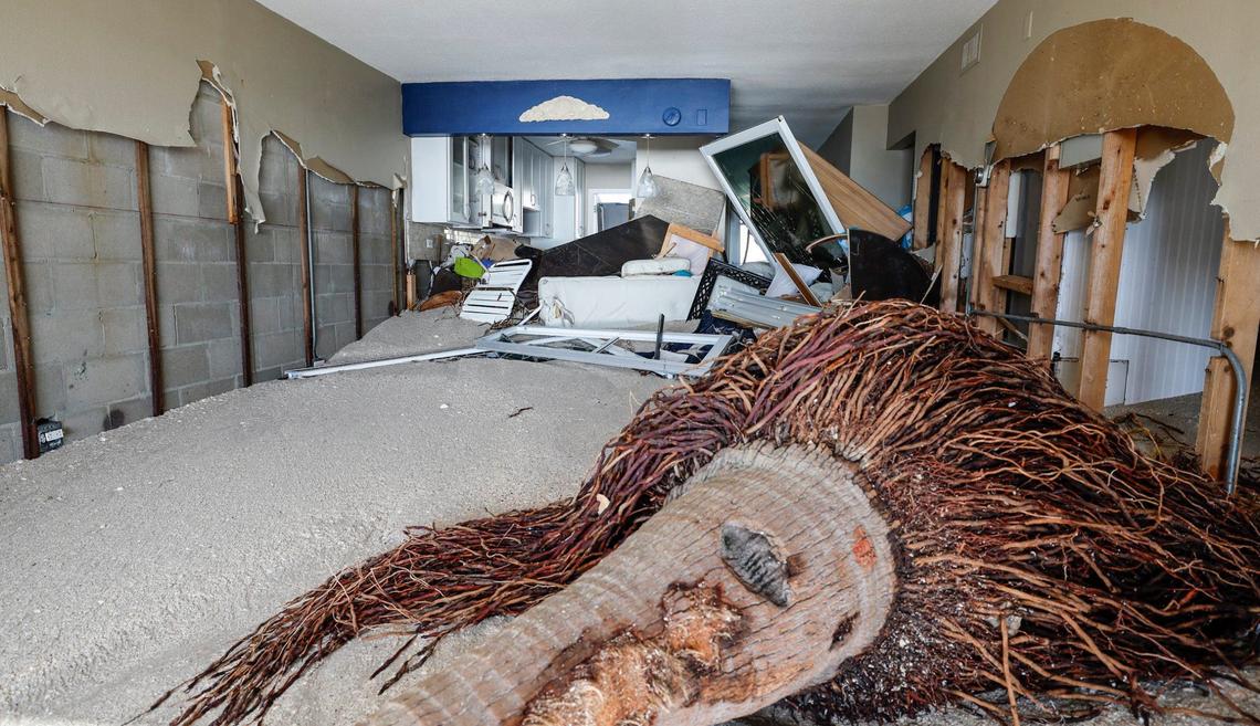 Storm surge and wind from hurricanes Helene and Milton caused beach erosion and damaged condos at Fisherman’s Cove beach front condominium rentals on Siesta Key, Florida on Thursday, October 10, 2024.