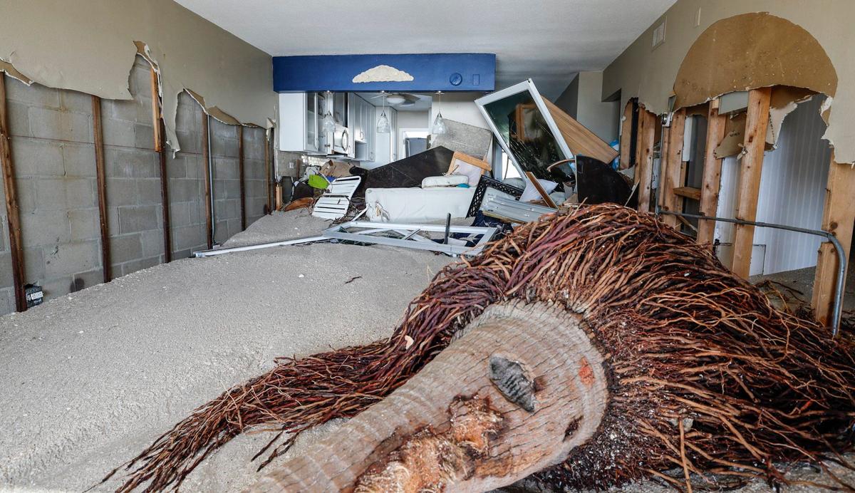 Storm surge and wind from hurricanes Helene and Milton caused beach erosion and damaged condos at Fisherman’s Cove beach front condominium rentals on Siesta Key, Florida on Thursday, October 10, 2024.