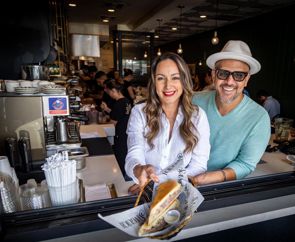 Rosa Romero and Daniel Figueredo show off their specialty: the pork-stuffed Cuban sandwich. “In our humble opinion,” Figueredo says, “it’s the perfect replica of the Cuban sandwich.”