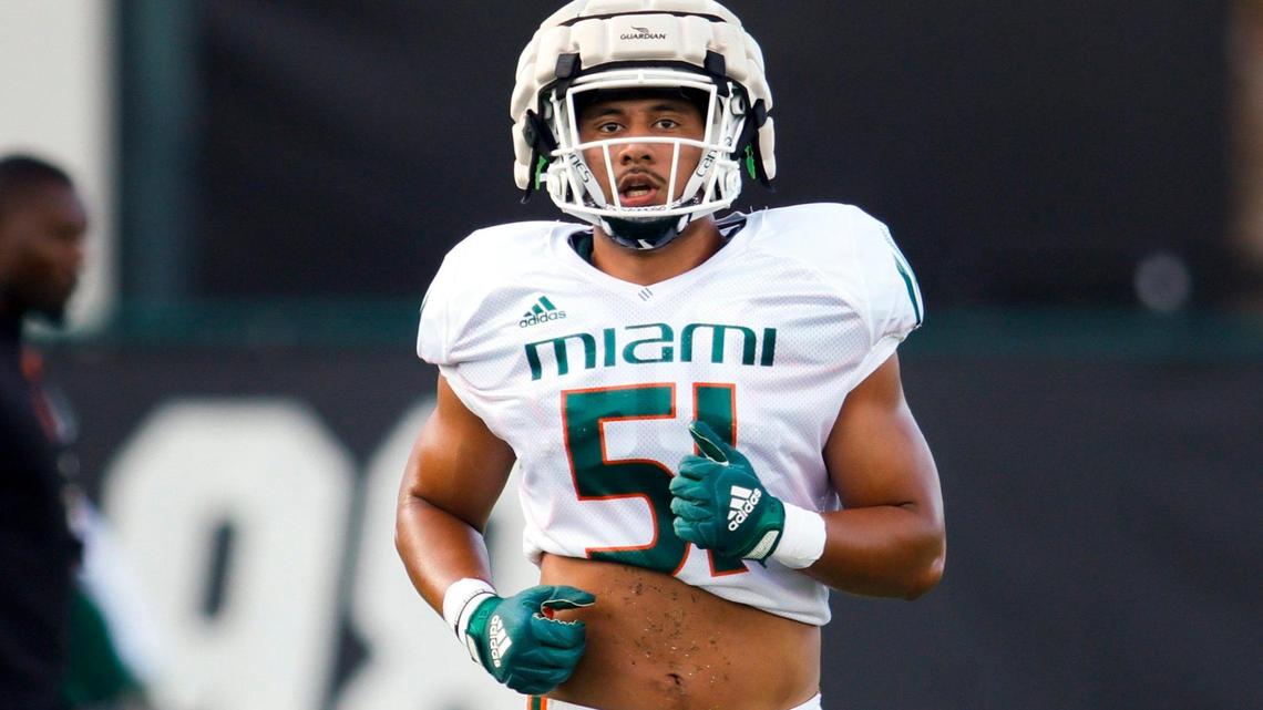 Miami Hurricanes linebacker Francisco Mauigoa (51) works out during football practice at the University of Miami campus in Coral Gables, Florida, Thursday, March 23, 2023.