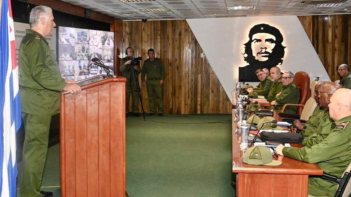 Cuba’s leader, Miguel Díaz-Canel, left, during a meeting attended by retired general Raúl Castro, to officially begin military exercises amid heightened tensions with the United States.