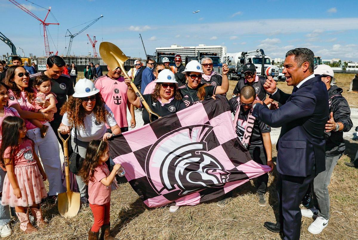 Miami Mayor Francis Suarez, at right, celebrates with members of the Southern Legion support group for Inter Miami CF after the groundbreaking ceremony at the former Melreese golf course, the future site of Miami Freedom Park under construction in Miami on Wednesday, Jan. 15, 2025.