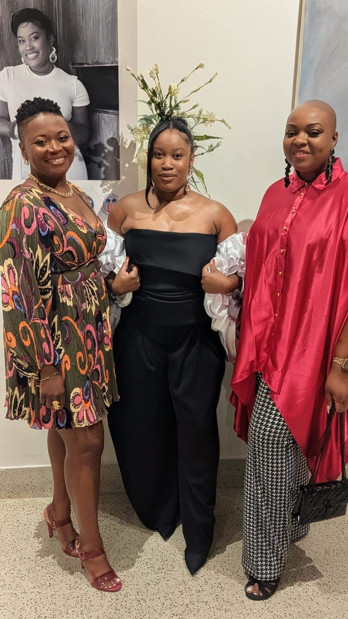 Little Haiti Cultural Center director Dasha Saintremy (left), Magdala Charles (center) and Jonise Louis at the opening night of the exhibit La Couronne Des Fleurs, which also honors those affected by breast cancer.