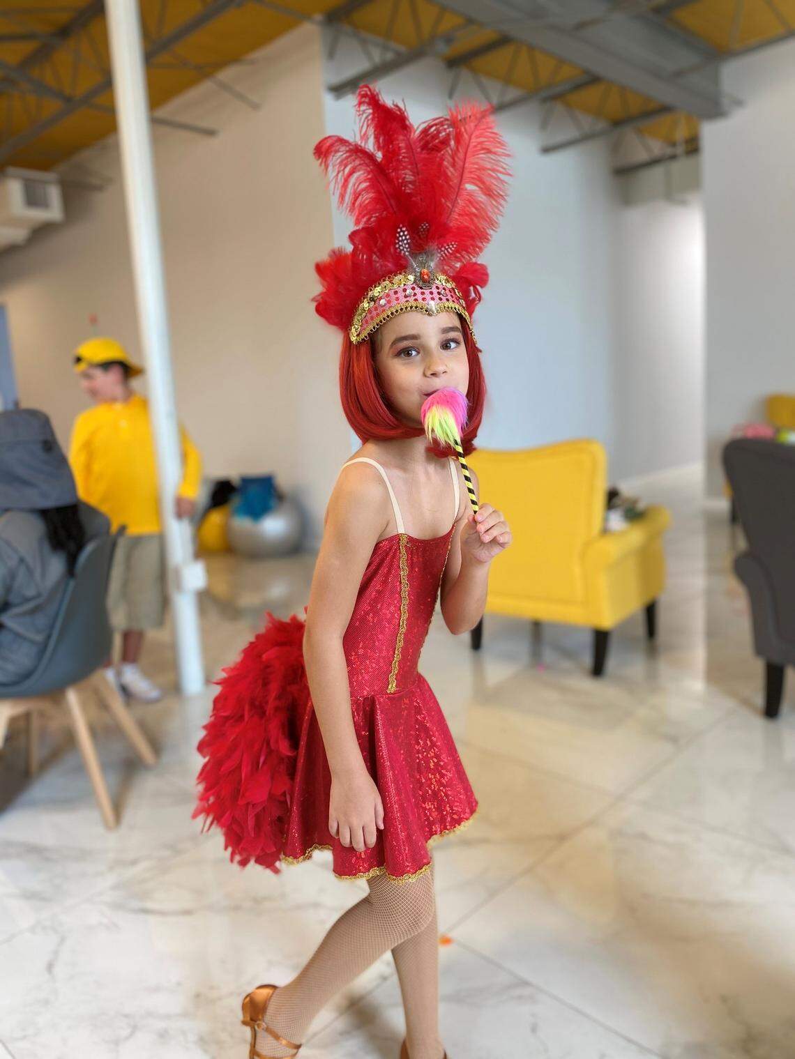Chloe Queiroz (red dress) performed in “Seussical Jr.,” a musical based on favorite Dr. Seuss characters, at LCA summer camp 2021.