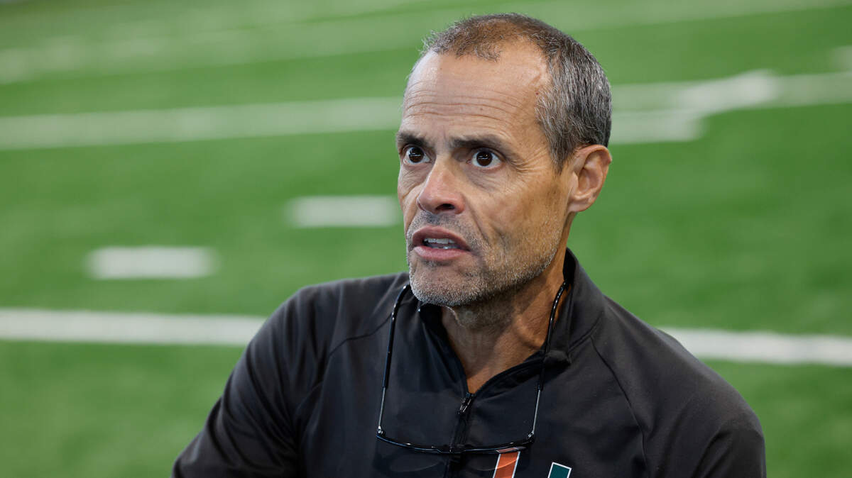 Miami Hurricanes Assistant Head Coach and Offensive Line Coach Alex Mirabal speaks to reporters at the University of Miami’s Carol Soffer Indoor Practice Facility on Tuesday, July 30, 2024.