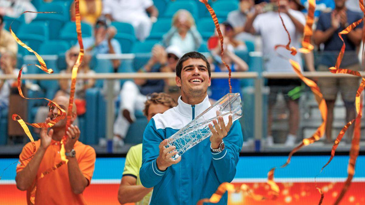 Carlos Alcaraz of Spain reacts during a trophy ceremony after beating Casper Ruud of Norway 7-5, 6-4 during the men’s singles finals of the Miami Open tennis tournament at Hard Rock Stadium on Sunday, April 3, 2022, in Miami Gardens, Fla.
