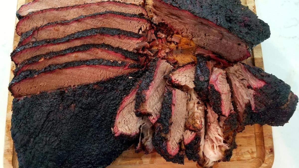 Smoked brisket will be one of the features at the upcoming Smoke & Dough in West Kendall, by the owners of Empanada Harry’s.