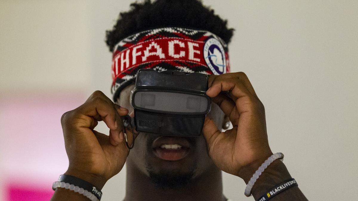 Miami Dolphins linebacker Jerome Baker explores an exhibit inside the Freedom Tower during the team’s Football Unites: Cultural Tours event on Tuesday, September 18, 2018. The event unites Miami Dolphins players, alumni and staff with community leaders and law enforcement to experience the cultural diversity of South Florida.