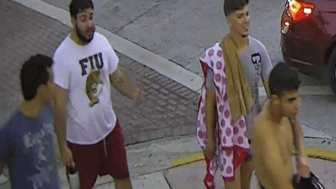 The FIU shirt worn by one of the alleged attackers, seen in this surveillance camera still, in Sunday's beating of a gay couple in Miami Beach sparked social media response from students and alumni