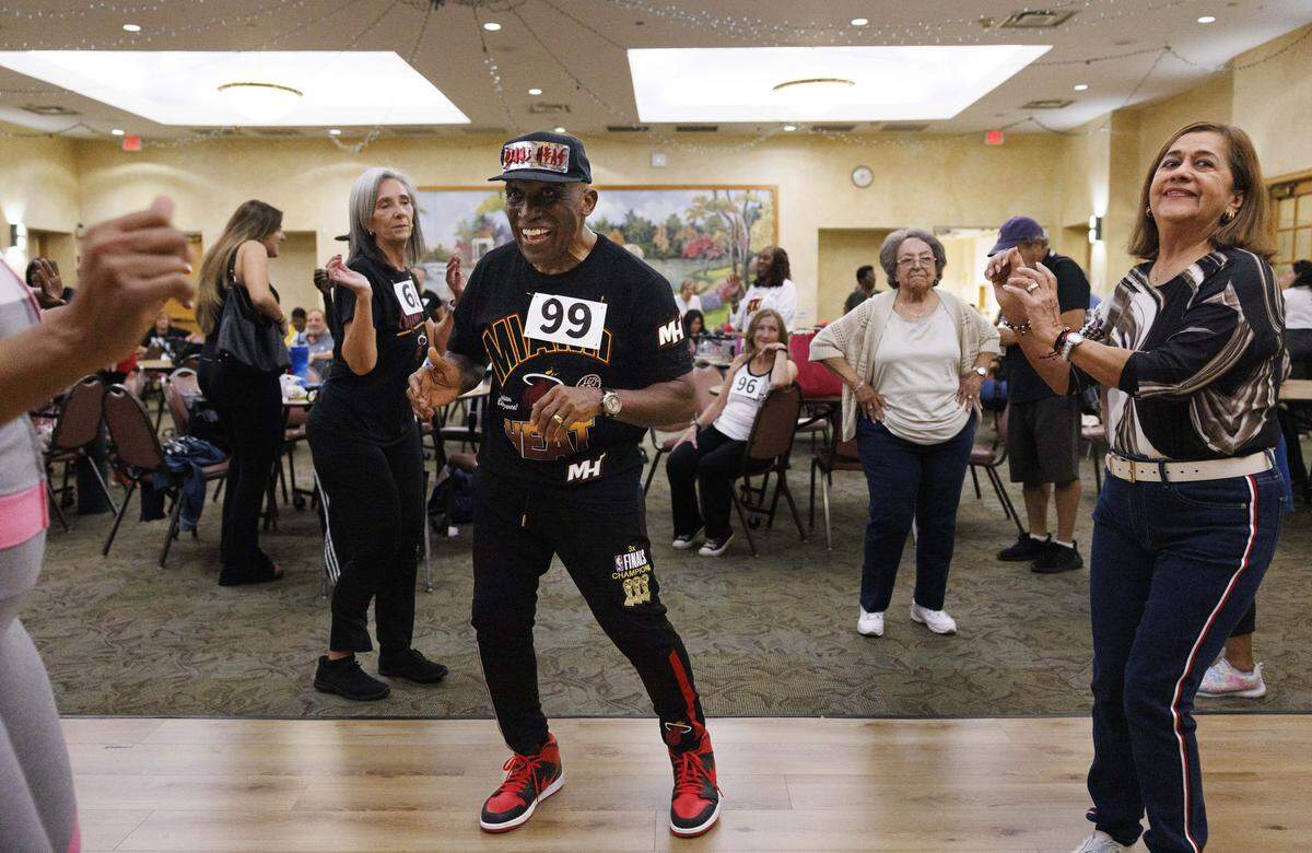 Sam McWoodson, a twenty year Golden Oldies dancer, center, dances during the HEAT Golden Oldies auditions for the Miami Heat senior dance team on Thursday, Sept. 25, 2025, at Southwest Focal Point Community Center in Pembroke Pines, Fla.