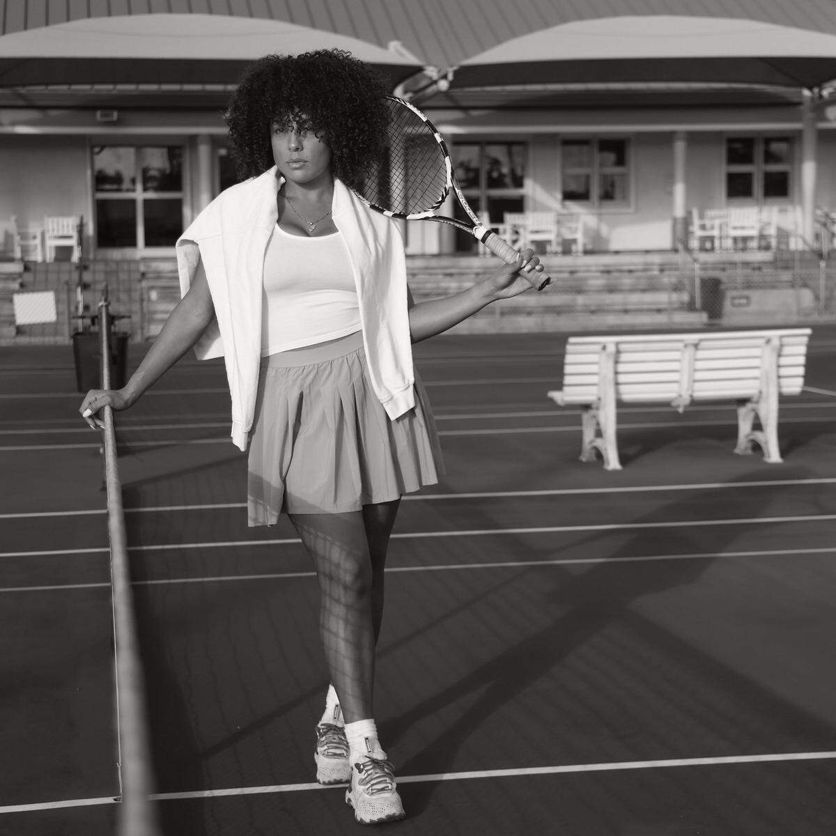 On Tuesday, January 31, 2023, publicist Francesca Morgan stays connected to her neighborhood and her Black roots through the game of tennis. She and her friends organize a de facto tennis club called the Slice Girls to play tennis at Moore Park’s Ashe-Buchholz Tennis Center. She feels playing tennis is a form of empowerment that has acknowledged the power of Black athletes in a primarily white sport. The Miami Herald reached out to 30-year-olds and under about being Black in Miami-Dade, the spaces they occupy, and how that reinforces their Black culture, identity, and pride.