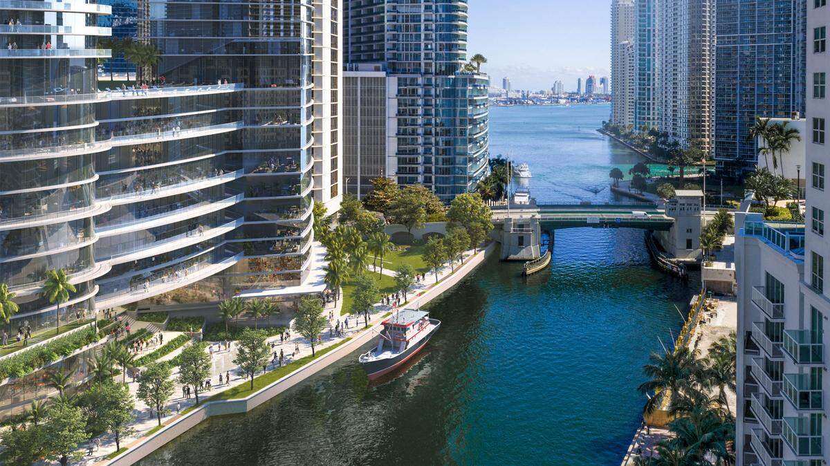 Esta representación muestra la vista hacia el este a lo largo del río Miami, con el diseño de un complejo remodelado del centro Hyatt/Knight a la izquierda.