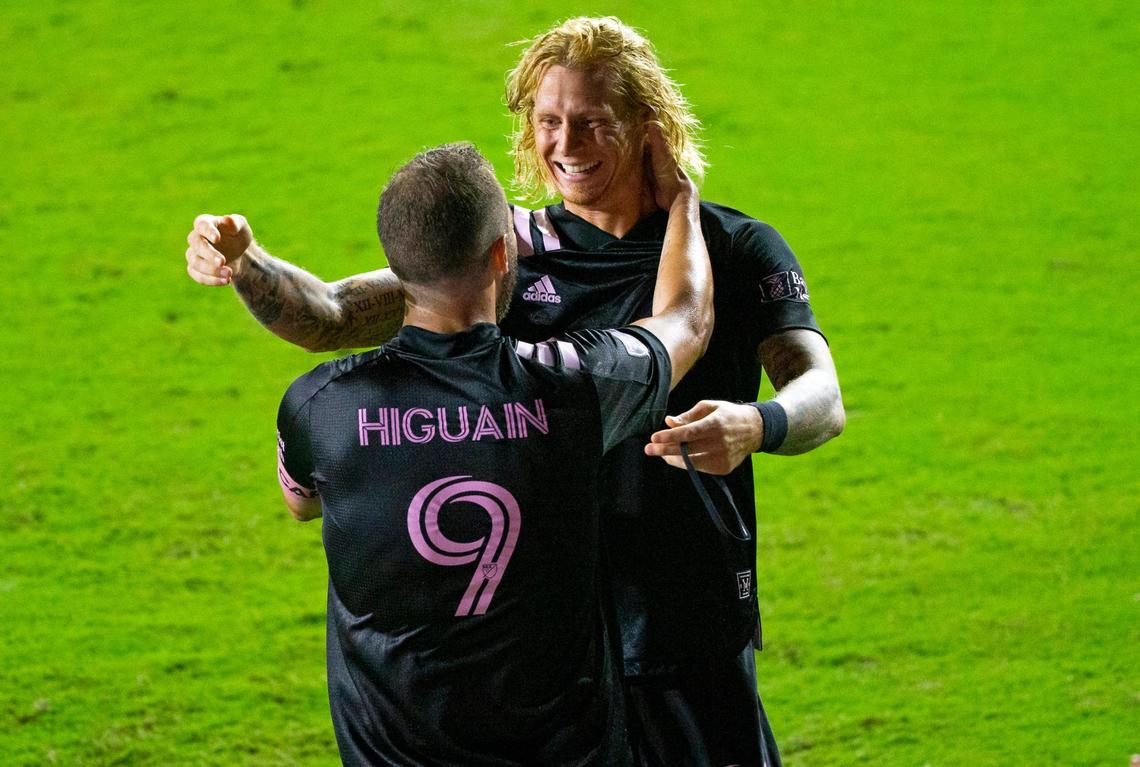 Inter Miami CF defender Brek Shea (28) is congratulated by teammate Gonzalo Higuain (9) after scoring during the second half of an MLS soccer match against the Atlanta United FC at Inter Miami CF Stadium on Wednesday, October 14, 2020, in Fort Lauderdale, Florida.