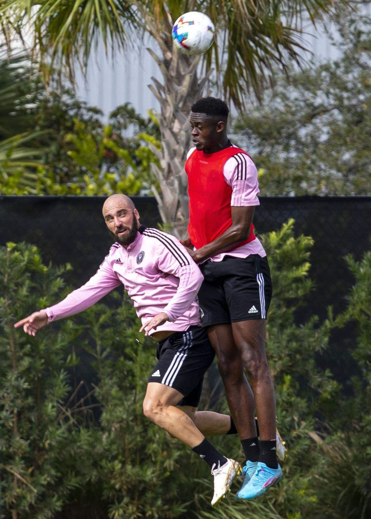 Inter Miami CF forward Gonzalo Higuain fights for the header with defender Aime Mabika during training camp at the 50,000-square-foot Inter Miami CF Training Center in Fort Lauderdale, Florida, on Thursday, January 20, 2022. The training center sits adjacent to the Club’s 19,100 capacity DRV PNK Stadium in Fort Lauderdale.