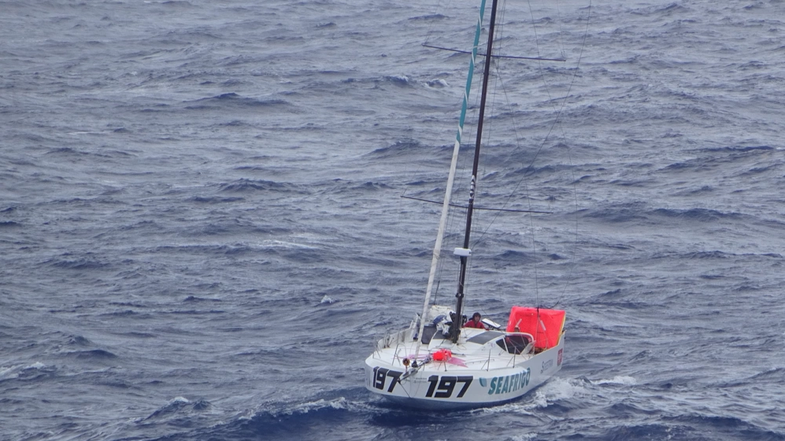 Two mariners faced a terrifying predicament in the remote Atlantic when lighting punched a hole in their sailboat, the U.S. Coast Guard reports.