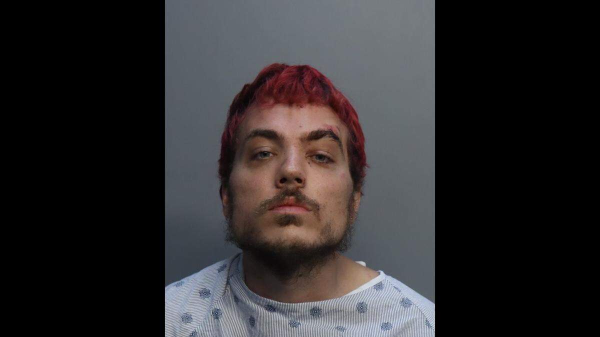 Christopher Keely, 27, has been arrested in Miami Beach after being on the run since Tuesday for the brutal murder of a Massachusetts couple, authorities said.