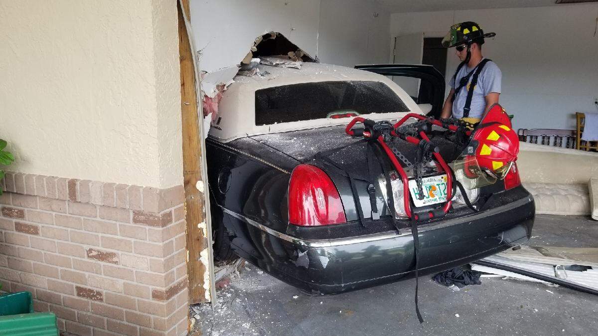 Three underage kids were returning the family car to a garage after a joy ride when the 14-year-old driver lost control and went through a wall and into a bedroom.