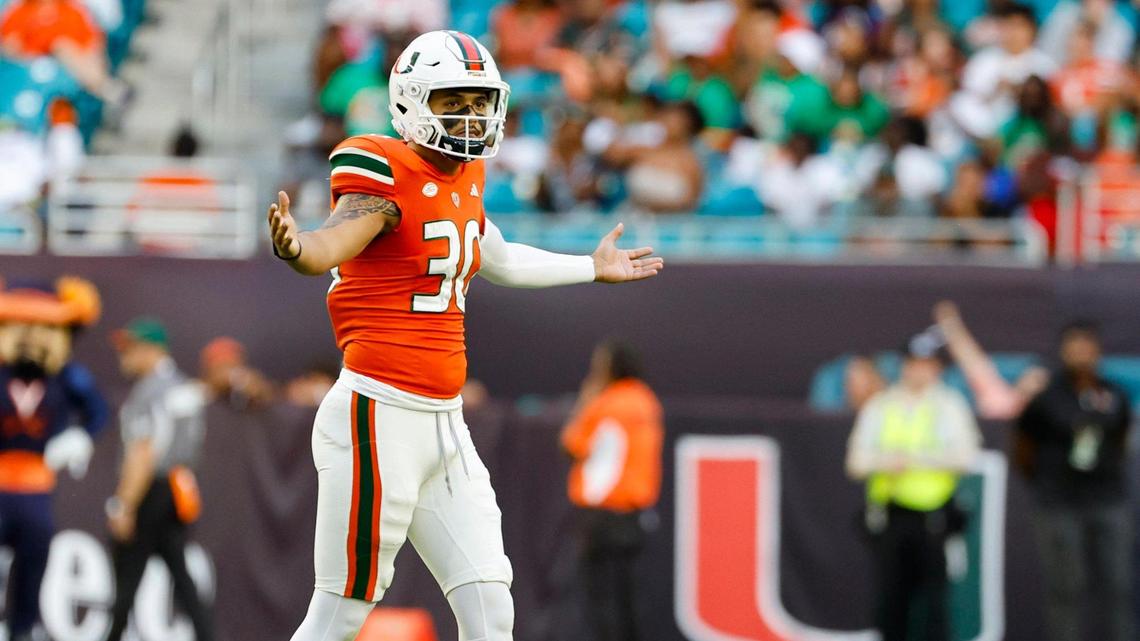 Miami Hurricanes place kicker Andres Borregales (30) reacts after scoring a three-pointer in the second half against the Virginia Cavaliers at Hard Rock Stadium in Miami Gardens on Saturday, October 28, 2023.