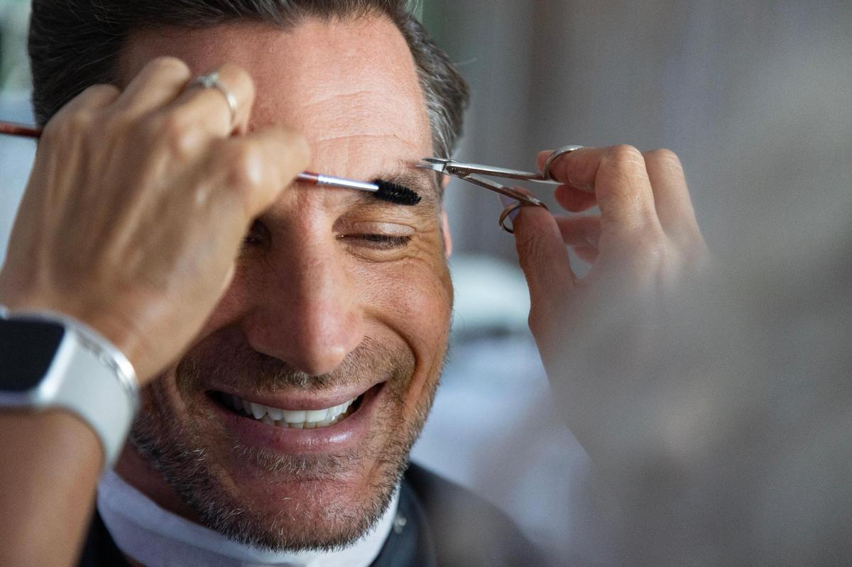 Lee touches up actor Lee Dahlberg’s eyebrows before he goes on set. One of Lee’s priorities while on the job is to make her subjects feel comfortable and able to relax and focus on doing their job. “Being able to do what I do and help others – it’s a blessing.”