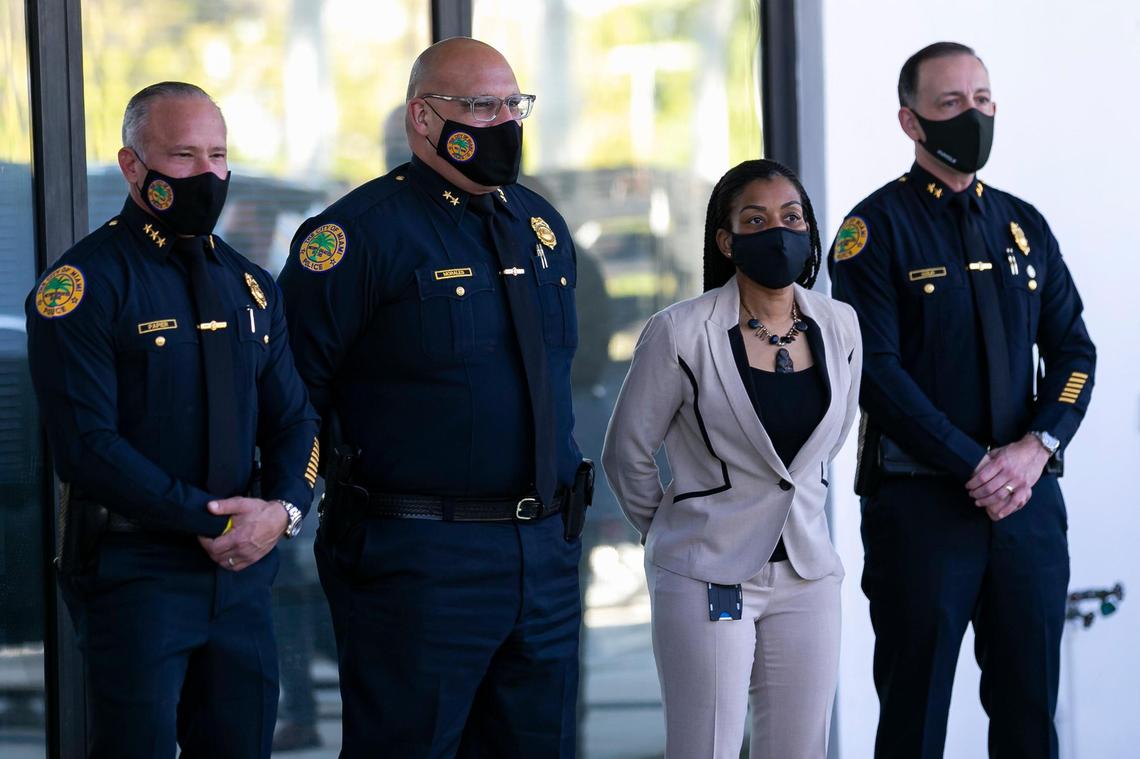 From left, City of Miami Officers Ron Papier, Manny Morales, Cherise Gause and Armando Aguilar Jr. attend a press conference at Miami City Hall where officials announced Art Acevedo would be their new police chief on Monday, March 15, 2021.