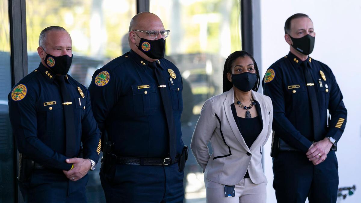 Acting Miami Police Chief Manny Morales, second from left, said Friday that three officers demoted by former Chief Art Acevedo, will return to their former rank as majors. The move comes after city commissioners amended the police budget to allow for the increased pay that comes with the posts.