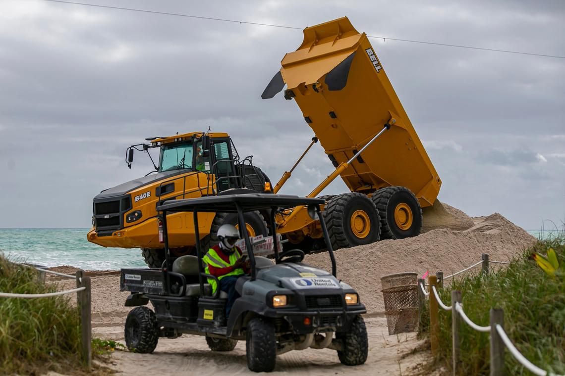 The U.S. Army Corps of Engineers dumps new sand from Central Florida along the Miami Beach shoreline near 65th Collins Avenue on Monday, January 13, 2019.