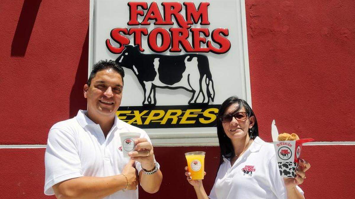 Luis Paez and his wife Paulina Pozo show favorite products like mini tequenos in the Farm Stores of Hialeah Gardens.