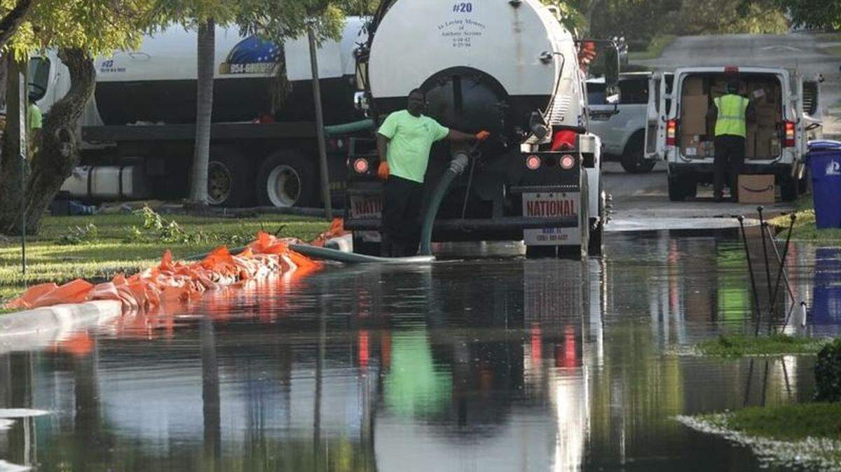 The cleanup of a sewage spill from a 54-inch sewer main continued Tuesday night into Wednesday.