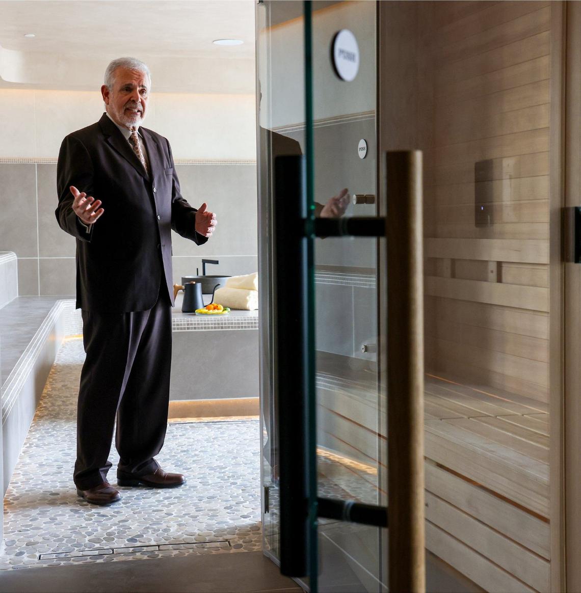 Russell Galbut gives a tour of the sauna/spa area at the soon-to-open Gale Miami Hotel & Residences during a recent property preview on Thursday, May 16, 2024 in Miami, Florida.