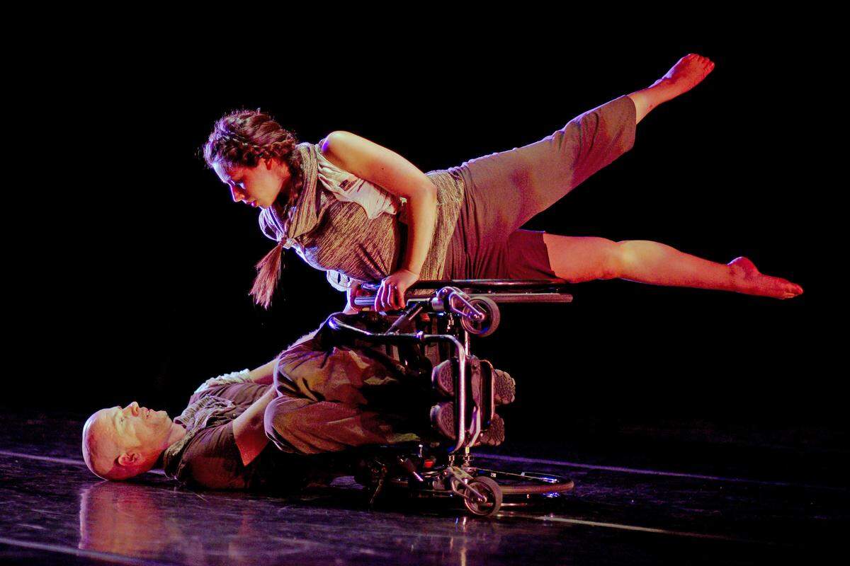 Dancers Dwayne Scheuneman and Marion Baldeon in REVolutions Dance’s “Cogs in the Machine” by Christina Acosta.