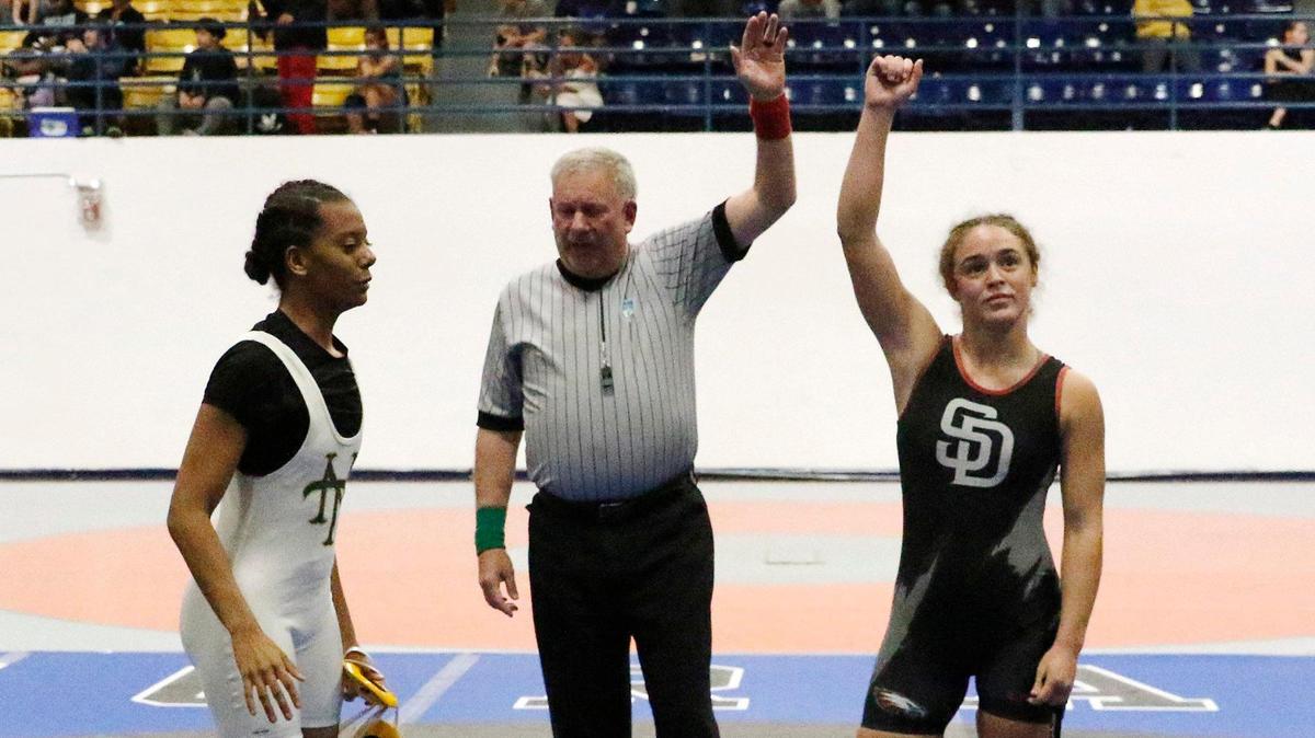 Stoneman Douglas’ Gabriela Caro celebrates her victory against Nova’s Nayara Stubna during the 130-pound BCAA wrestling championship on Saturday, February 3, 2024 at Pompano Beach High.