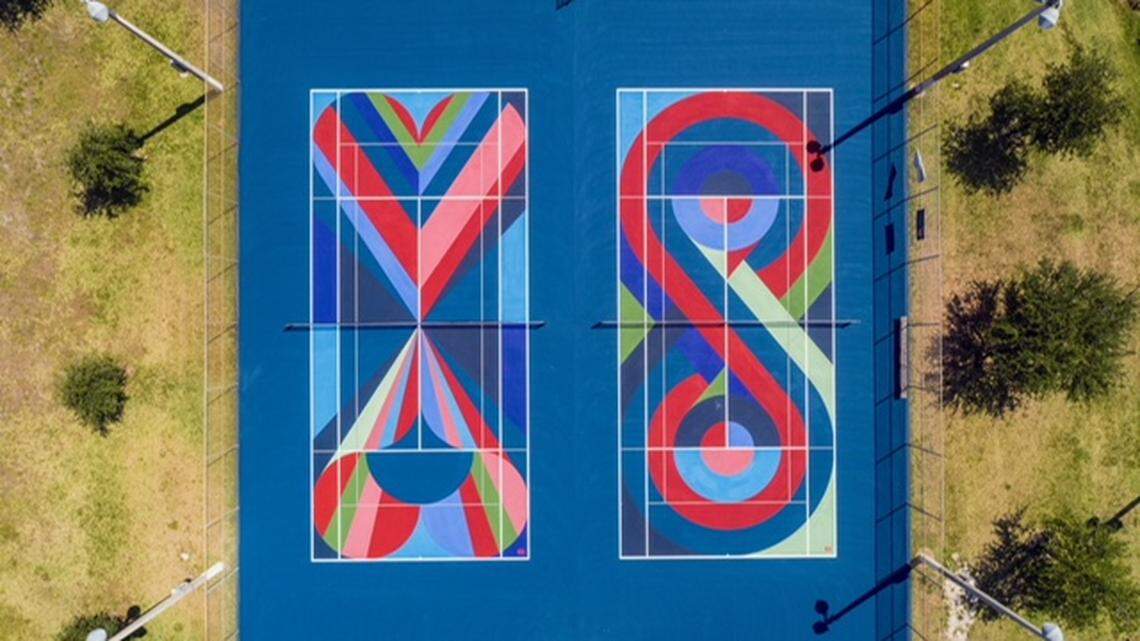 The tennis courts at Norman and Jean Reach Park in Hialeah are painted in bold colors as part of a U.S. Tennis Association community outreach initiative.