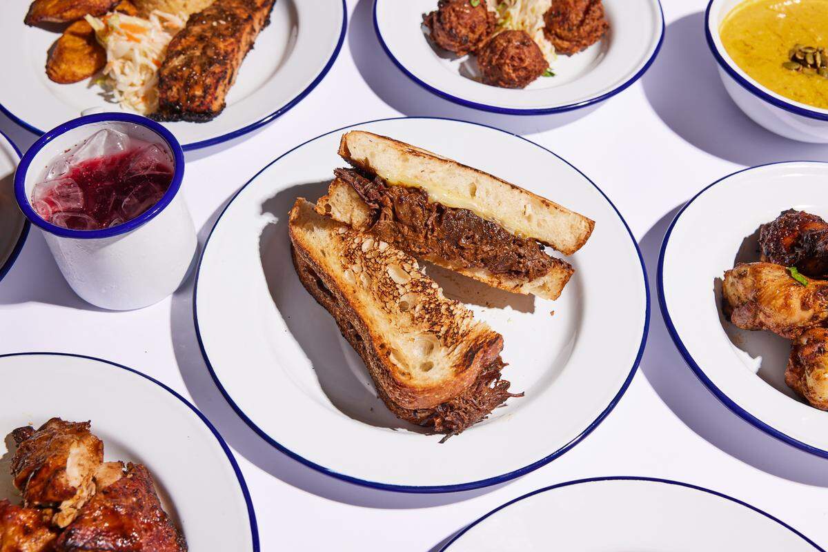 Oxtail grilled cheese, codfish fritters and pumpkin corn soup are just some of the Trinidadian specialties on the menu at Clyde’s Caribbean at Time Out Market Miami.