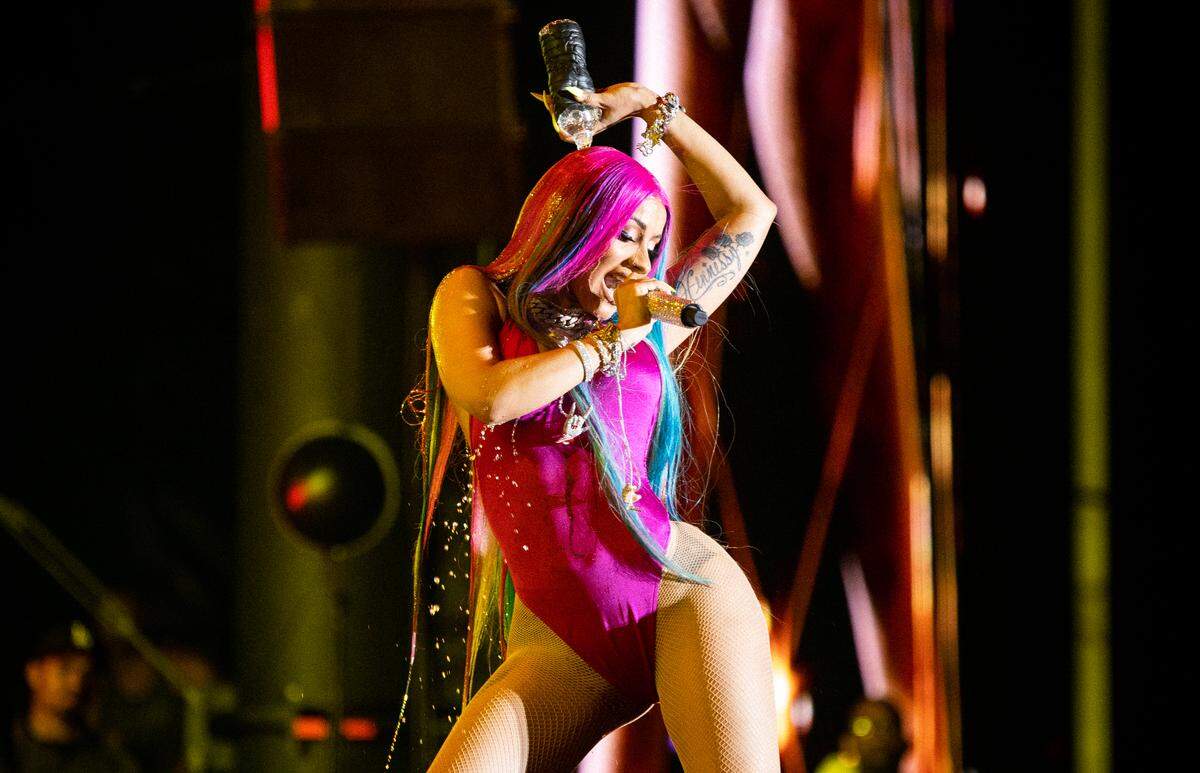 Cardi B pours water over her head at Rolling Loud in May 2019.