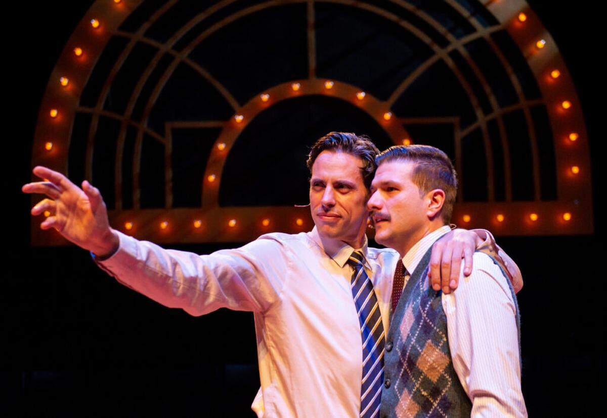 Robert Koutras as Ernst Ludwig befriends Teddy Warren as Cliff Bradshaw in Zoetic Stage’s production of “Cabaret.”