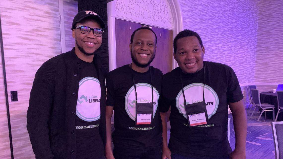 Mac Alabre, left, leads the Lien Library team, which also includes co-founder Rohansen Joseph, center; and Sondley Northecide.