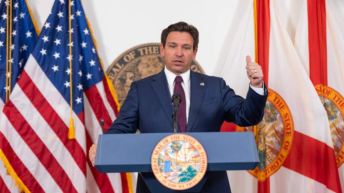 Florida Gov. Ron DeSantis speaks with reporters at the Florida State Capitol on March 4, 2025, in Tallahassee.