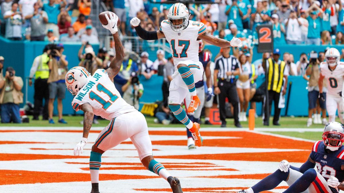 Miami Dolphins wide receiver Cedrick Wilson Jr. (11) celebrates with teammate Jaylen Waddle (17) after scores a touchdown during second quarter of an NFL football game against the New England Patriots at Hard Rock Stadium on Sunday, Oct. 29, 2023 in Miami Gardens, Fl.