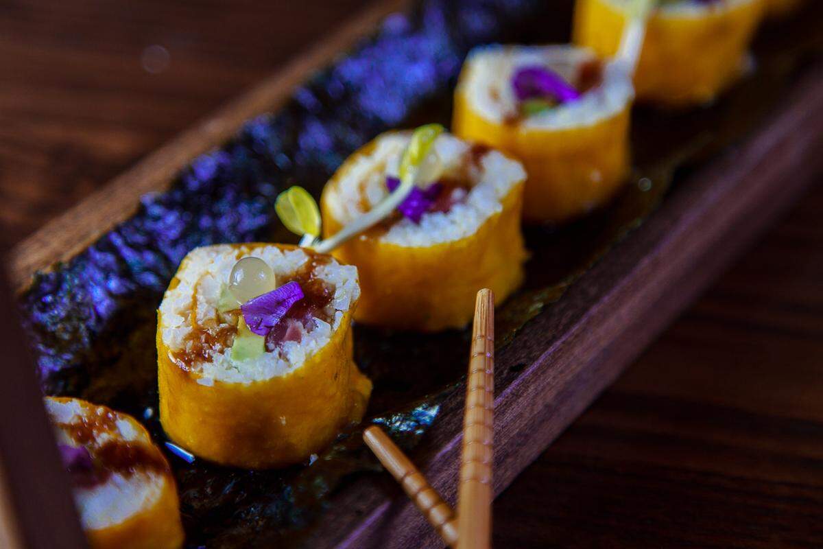 There are sushi rolls on the menu at Sins Gastrobar.