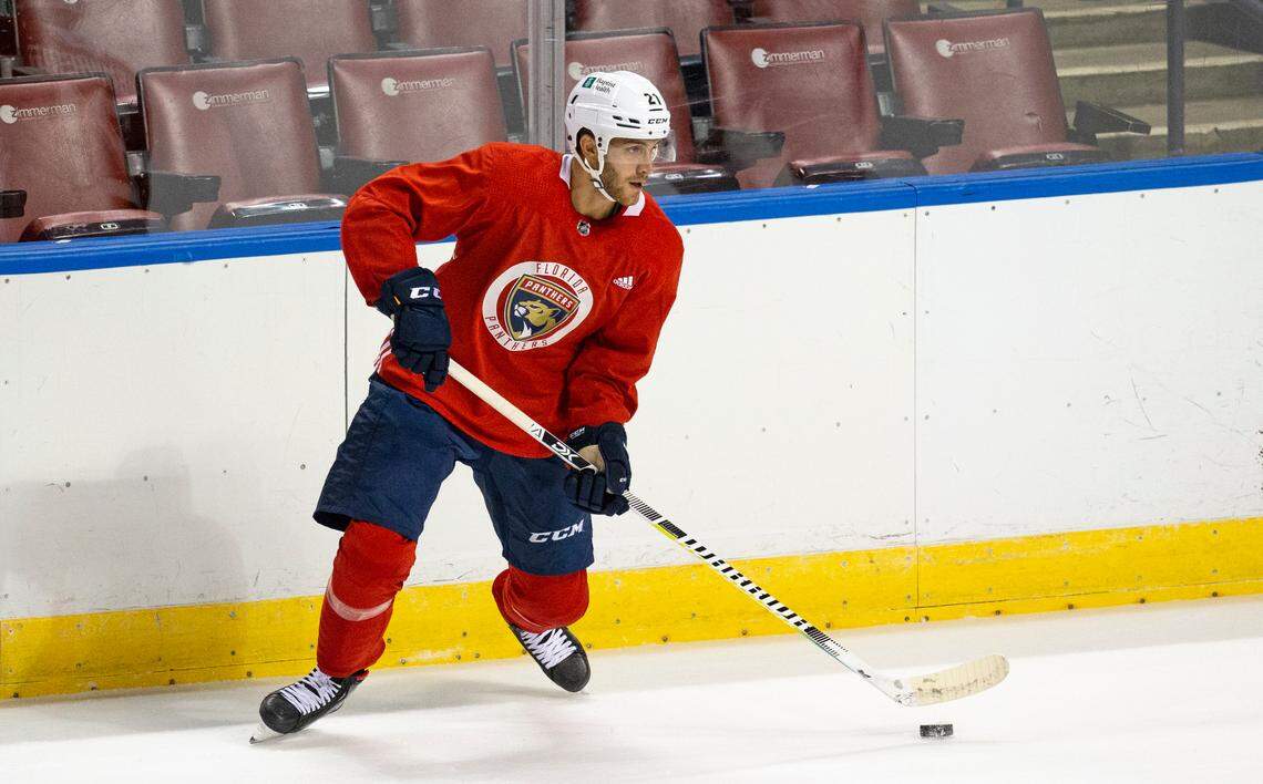 Florida Panthers center Alex Wennberg (21) drives down the ice with the puck during the first practice of training camp in preparation for the 2020-21 NHL season at the BB&T Center on Monday, January 4, 2021 in Sunrise.