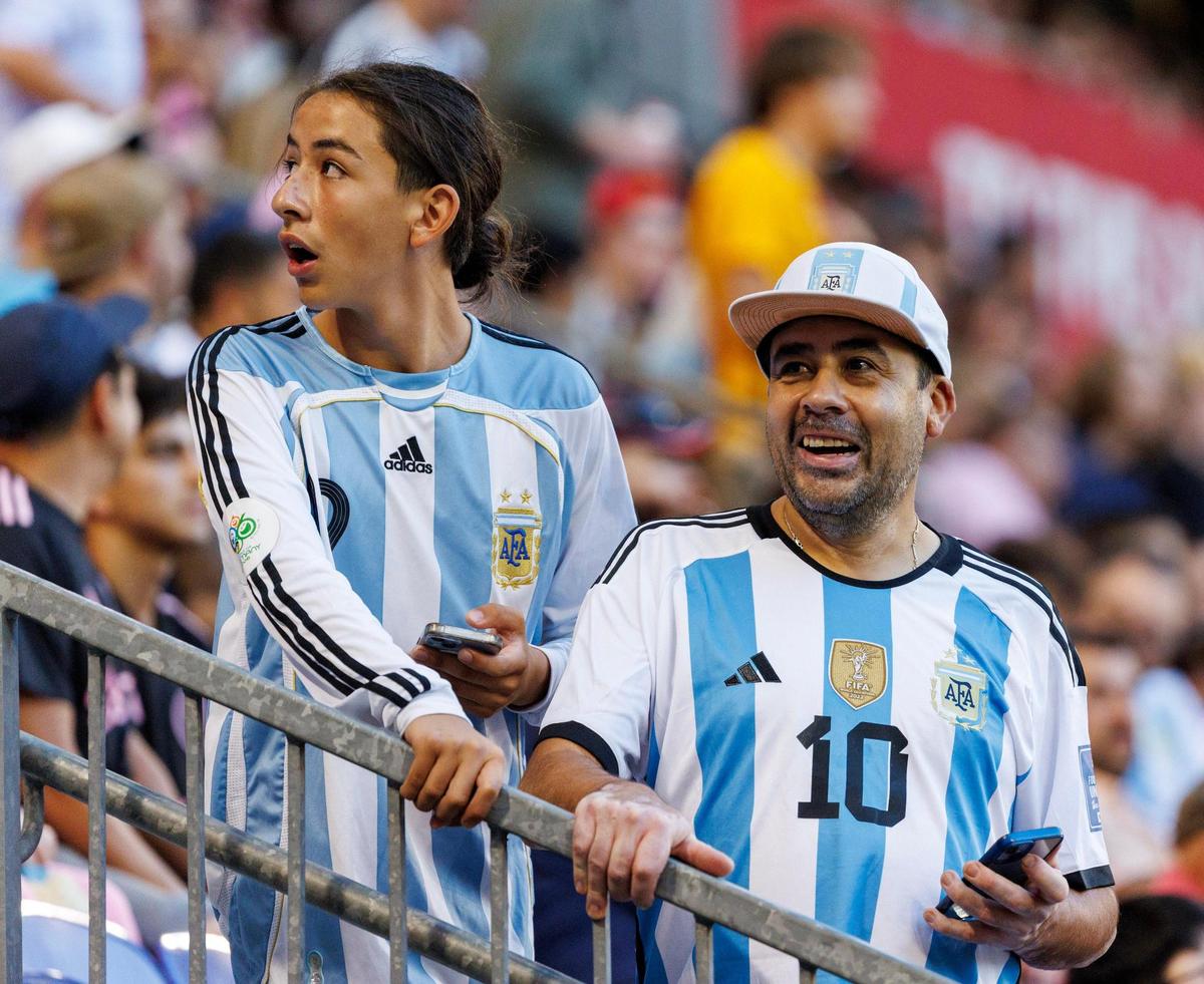 Soccer fans wearing Argentina national team jerseys look from the stands before the start of a MLS match between Inter Miami against New York Red Bulls at Red Bull Arena on Saturday, Aug. 26, 2023, in Harrison, N.J.