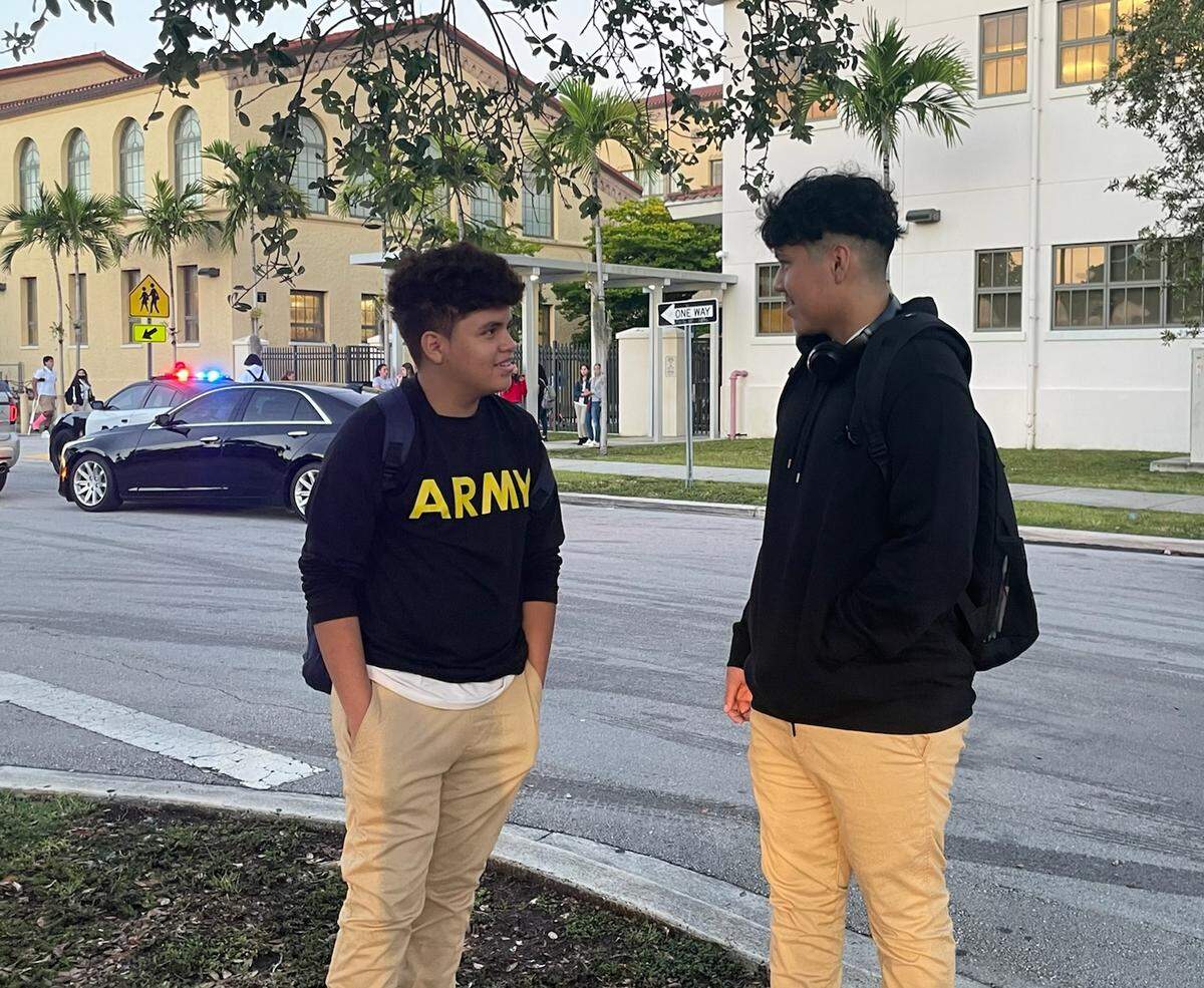 Andy Martinez, 15, left, and Anderson Figueroa, 15, talk before heading off to the first day of classes at Miami Senior High on Wednesday, Aug. 17, 2022. Miami High was beset with angry parents upset that their children had not received their class schedules before school started on Wednesday, leading to long lines to get into the school office on Wednesday morning, before the 7:20 a.m. start of classes.