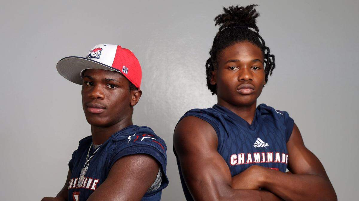 Seniors Joshisa Trader, left, and Jeremiah Smith, right, wide receivers from Chaminade Madonna College Preparatory is photographed during Broward High School Media Day at Pompano Beach High on Wednesday, August 2, 2023.