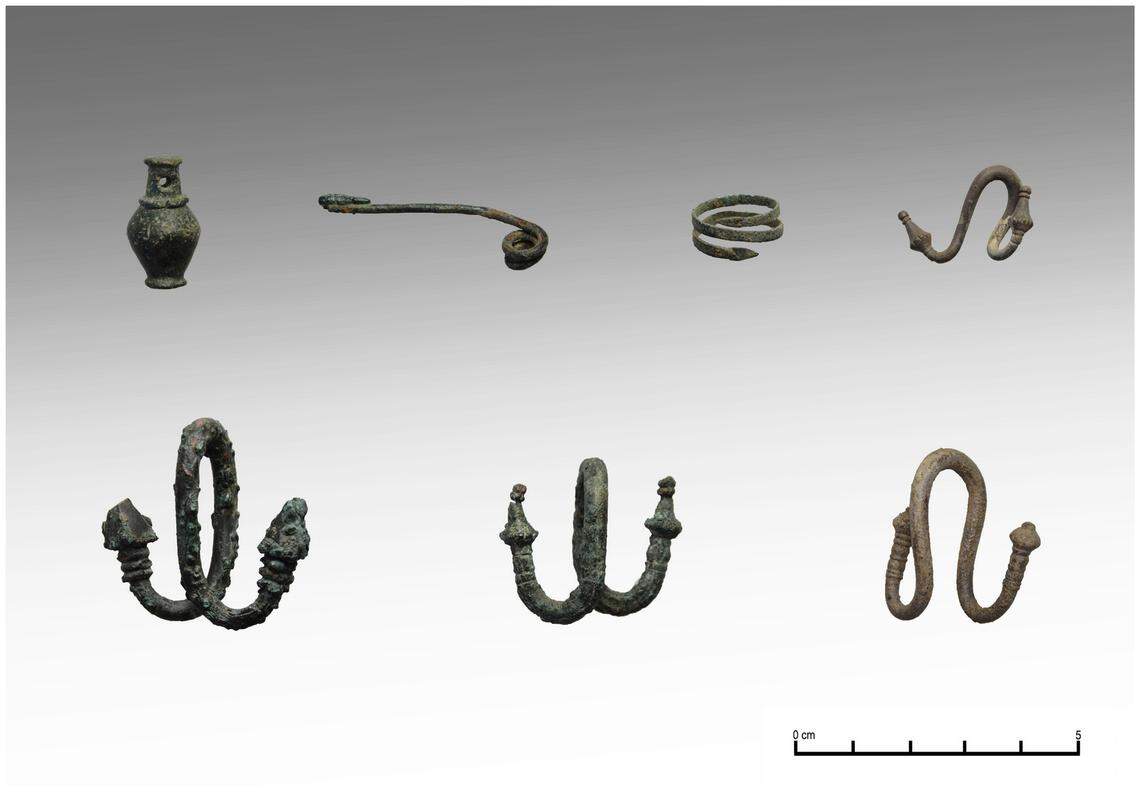 Some copper and silver jewelry pieces, including pins, rings and pendents, found at the sanctuary.