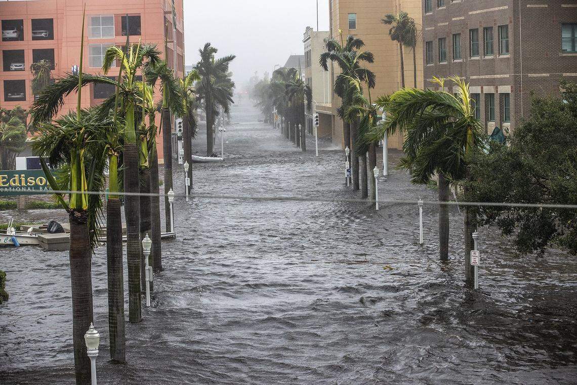 Streets of downtown in Fort Myers get flooded due to the surge of the Caloosahatchee River as Hurricane Ian hits the southwest coast of Florida as a Category 4 storm on Wednesday, Sept. 28, 2022.