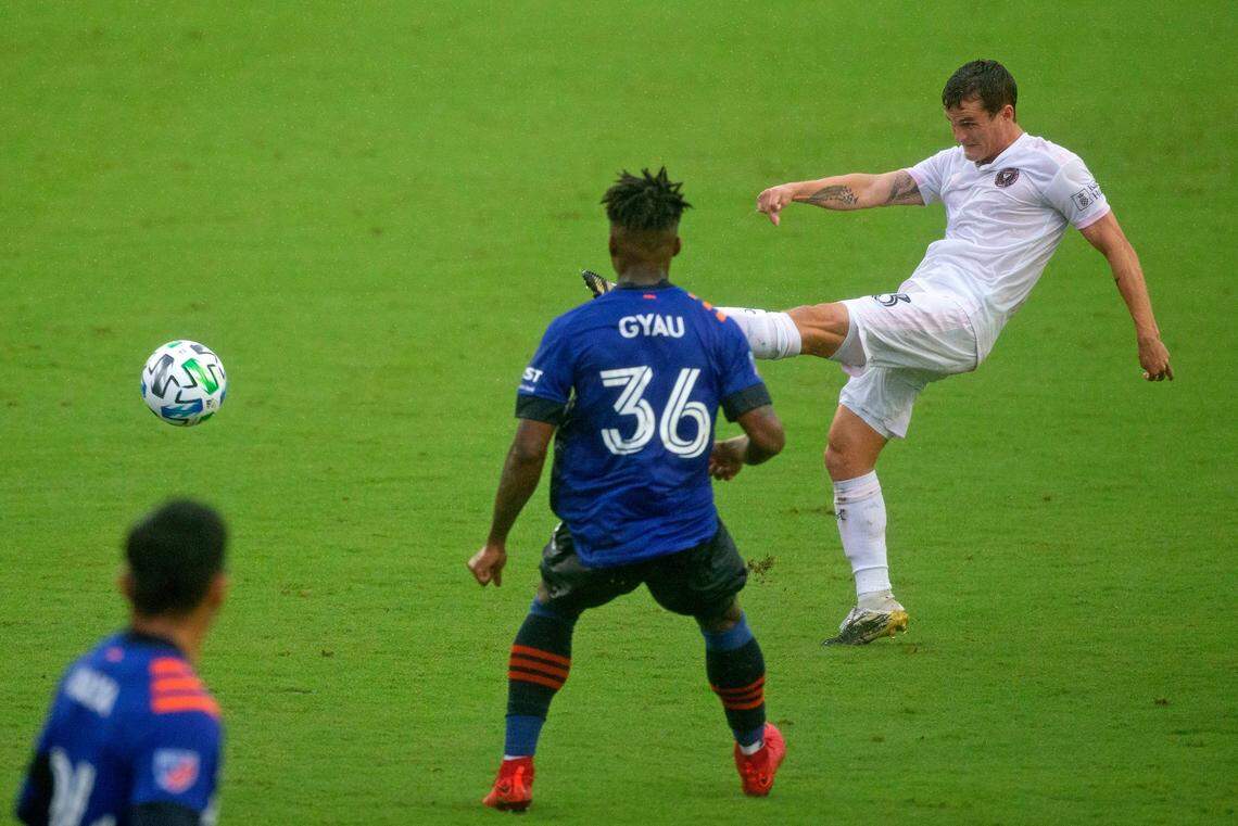 Inter Miami CF defender Mikey Ambrose (33) scores a goal past FC Cincinnati midfielder Joseph-Claude Gyau (36) during the first half of an MLS soccer match at Inter Miami CF Stadium on Sunday, November 8, 2020, in Fort Lauderdale, Florida.