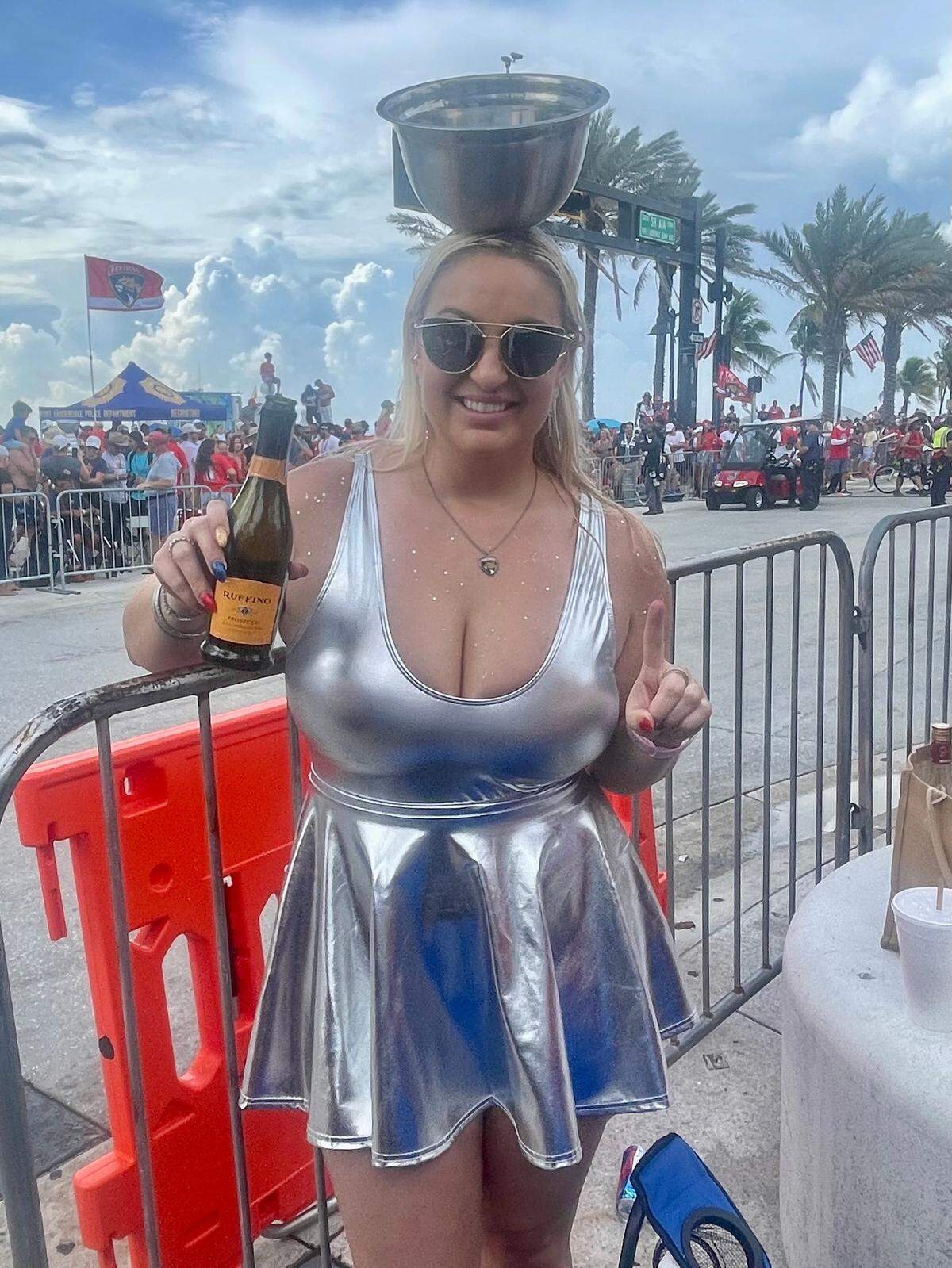 Gabby Kiger poses for a photo while wearing a costume of the Stanley Cup at the Florida Panthers championship parade in Fort Lauderdale on Sunday, June 30, 2024.